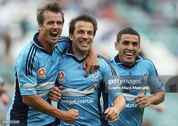 Alessandro Del Piero of Sydney FC celebrates with teammates Joel Griffiths and Ali Abbas after scoring a goal during the round 17 A-League match...