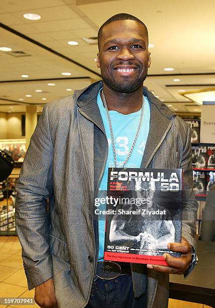 Cent promotes the new book "Formula 50: A 6-Week Workout and Nutrition Plan That Will Transform Your Life" at Barnes & Noble on January 18, 2013 in...