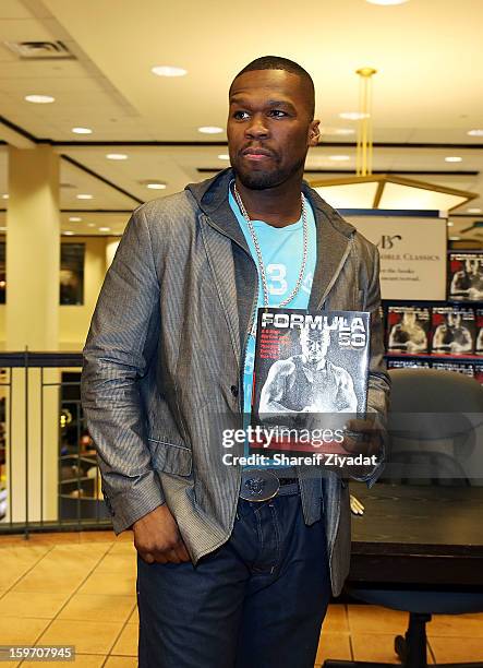 Cent promotes the new book "Formula 50: A 6-Week Workout and Nutrition Plan That Will Transform Your Life" at Barnes & Noble on January 18, 2013 in...