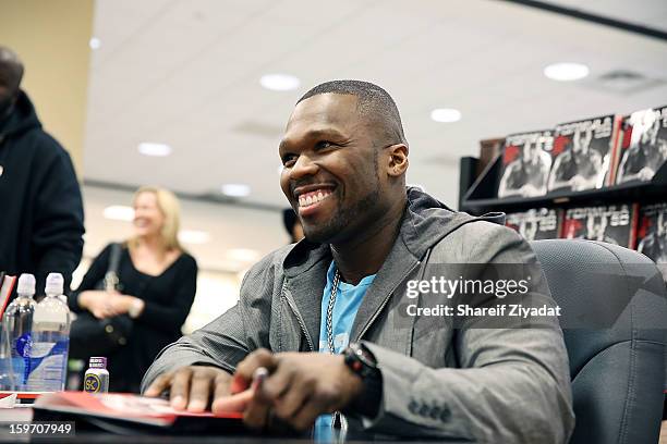 Cent promotes the new book "Formula 50: A 6-Week Workout and Nutrition Plan That Will Transform Your Life" at Barnes & Noble on January 18, 2013 in...