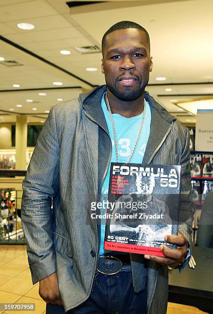 Cent promotes the new book "Formula 50: A 6-Week Workout and Nutrition Plan That Will Transform Your Life" at Barnes & Noble on January 18, 2013 in...