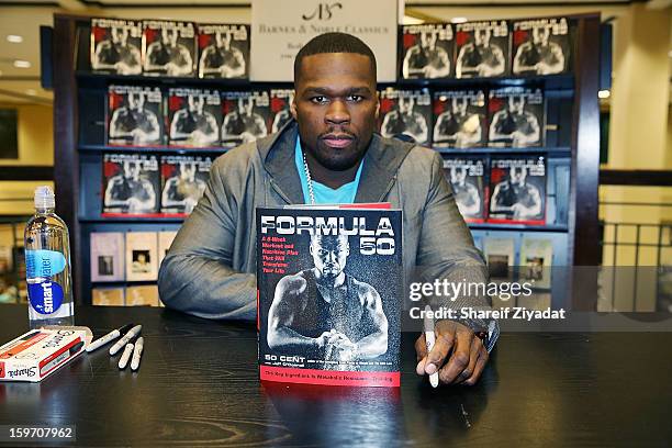 Cent promotes the new book "Formula 50: A 6-Week Workout and Nutrition Plan That Will Transform Your Life" at Barnes & Noble on January 18, 2013 in...