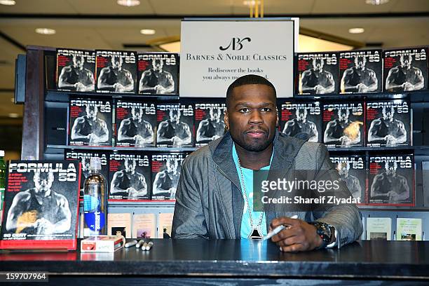 Cent promotes the new book "Formula 50: A 6-Week Workout and Nutrition Plan That Will Transform Your Life" at Barnes & Noble on January 18, 2013 in...