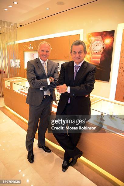 Stephen Urquhart and Greg Norman pose at OMEGA Boutique Opening At Phipps Plaza on January 17, 2013 in Atlanta, Georgia.