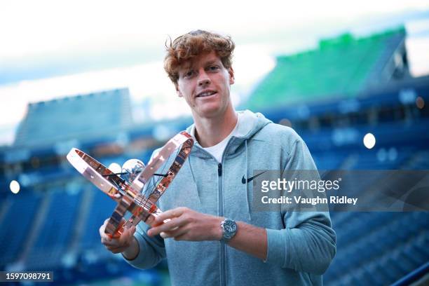 Jannik Sinner of Italy with the champions trophy after his win against Alex De Minaur of Australia in the Singles Final during Day Seven of the...