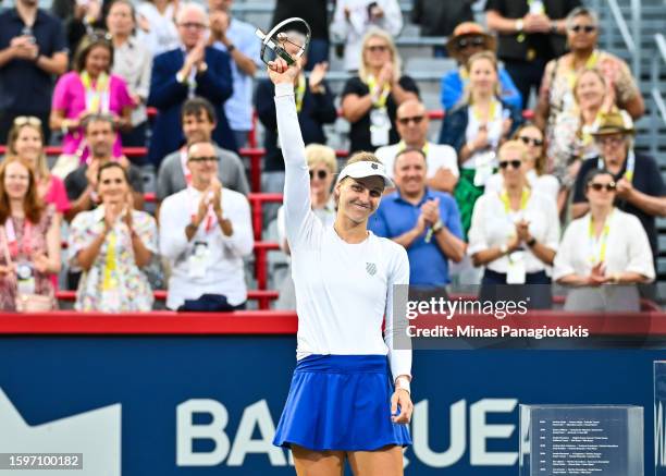 Liudmila Samsonova holds up her trophy after her 6-1, 6-0 loss to Jessica Pegula of the United States in the final round on Day 7 during the National...