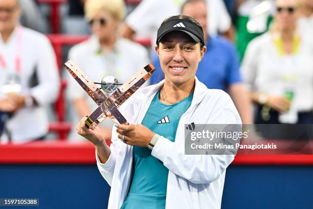 Jessica Pegula of the United States of America holds up the National Bank Open trophy after her 6-1, 6-0 victory against Liudmila Samsonova in the...