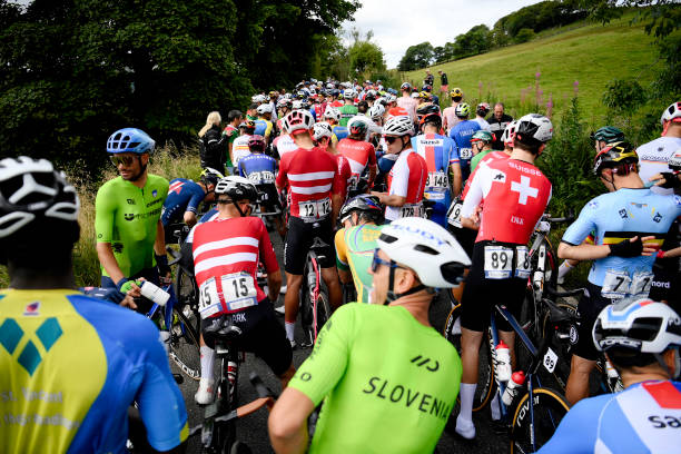 The peloton stopped as the race is temporarily interrupted by protesters during the 96th UCI Cycling World Championships Glasgow 2023, Men Elite Road...