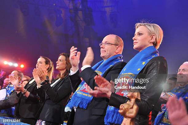 In this handout image provided by the Palais Princier de Monaco, Princess Charlene of Monaco and Prince Albert II of Monaco attend the opening of the...