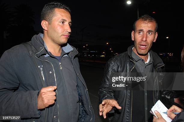 Freed Algerian hostages arrive at Algiers airport after they were released by Islamist captors, alongside other Algerians, from a gas plant in In...