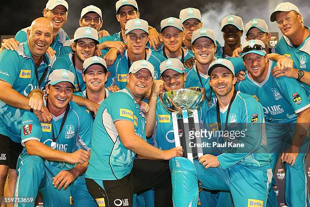 The Heat pose with the trophy after winning the Big Bash League final match between the Perth Scorchers and the Brisbane Heat at the WACA on January...