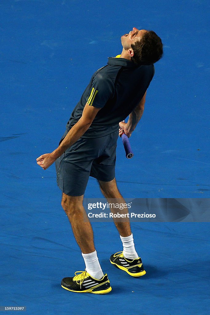 Gilles Simon of France celebrates a win in his third round match ...