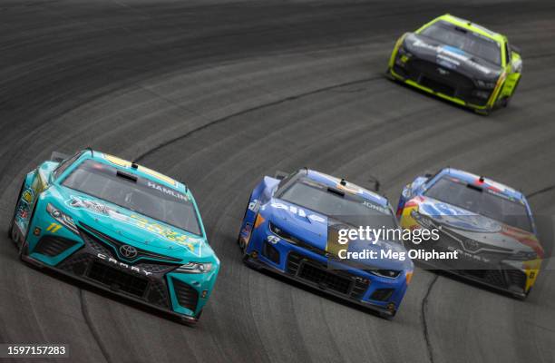 Denny Hamlin, driver of the Mavis Tires & Brakes Toyota, Erik Jones, driver of the Allegiant Chevrolet, Tyler Reddick, driver of the Rocket League...