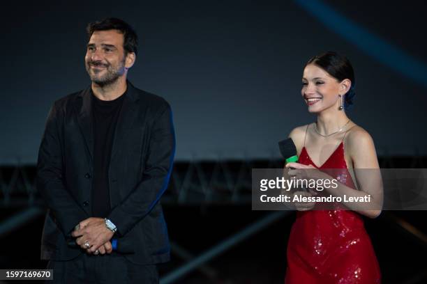 Edoardo Lei and Ambrosia Caldarelli on stage during the 76th Locarno Film Festival on August 06, 2023 in Locarno, Switzerland.