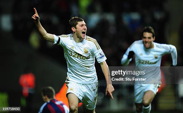 Swansea player Ben Davies celebrates the first goal during the Barclays Premier League match between Swansea City and Stoke City at Liberty Stadium...