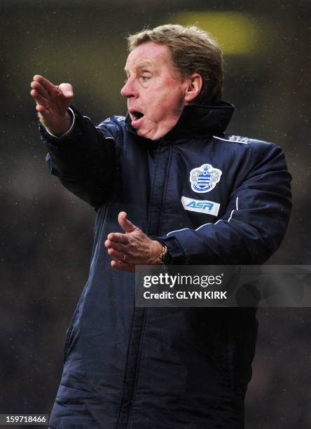 Queens Park Rangers' English manager Harry Redknapp gestures to players during the English Premier League football match between West Ham United and...