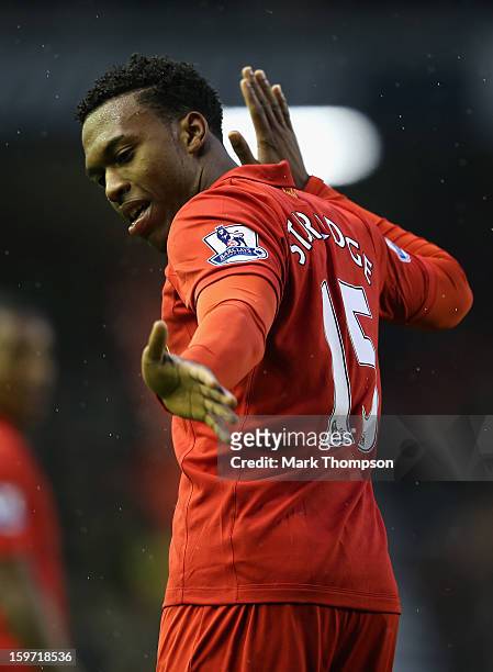 Daniel Sturridge of Liverpool celebrates scoring his team's third goal during the Barclays Premier League match between Liverpool and Norwich City at...