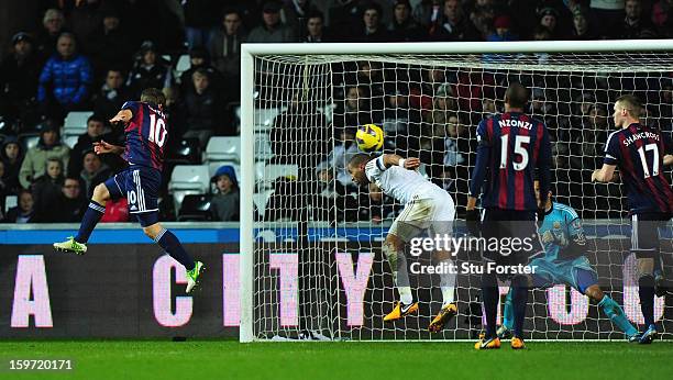 Stoke player Michael Owen scores the Stoke goal during the Barclays Premier League match between Swansea City and Stoke City at Liberty Stadium on...