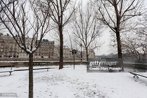 Snow covers the streets on January 19, 2013 in Paris, France. Heavy snowfall fell throughout Europe and the UK causing travel havoc and white layers...