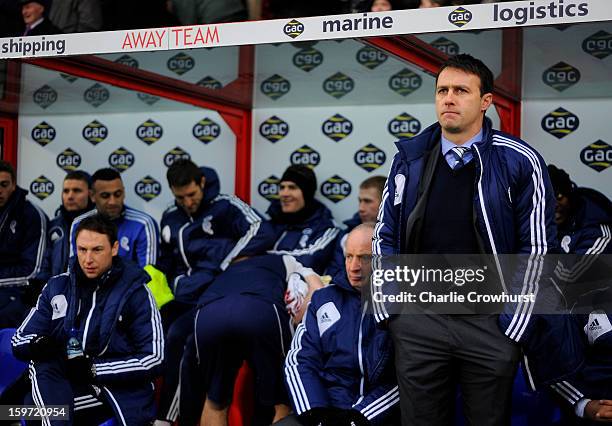 Bolton manager Dougie Freedman stands in the dugout during the npower Championship match between Crystal Palace and Bolton at Selhurst Park on...