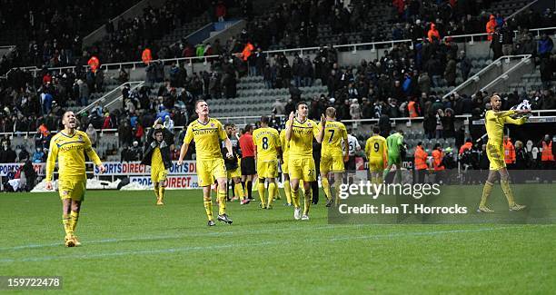 Jobi McAnuff, Alex Pearce, Stephen Kelly and Jimmy Kebe of Reading celebrate their victory after the Barclays Premier League match between Newcastle...