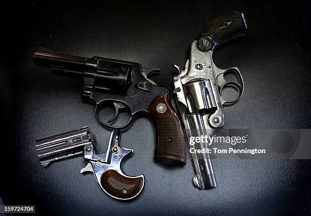 Detail view of pistols that were turned in during a gun buy back program at the First Presbyterian Church of Dallas on January 19, 2013 in Dallas,...