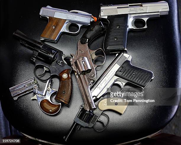 Detail view of pistols that were turned in during a gun buy back program at the First Presbyterian Church of Dallas on January 19, 2013 in Dallas,...