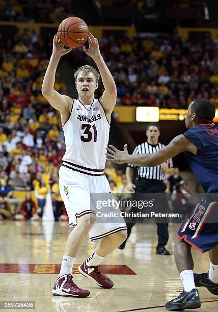 Jonathan Gilling of the Arizona State Sun Devils passes the ball during the first half of the college basketball game against the Arizona Wildcats at...