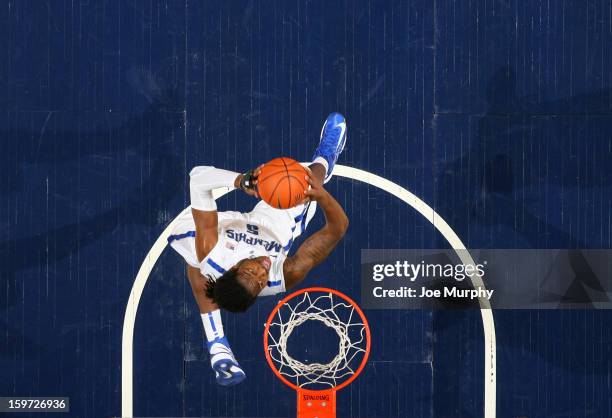 Shaq Goodwin of the Memphis Tigers goes up for a revers dunk against the Harvard Crimson on January 19, 2013 at FedExForum in Memphis, Tennessee.