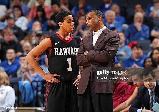 Tommy Amaker, head coach of the Harvard Crimson talks with Siyani Chambers against the Memphis Tigers on January 19, 2013 at FedExForum in Memphis,...