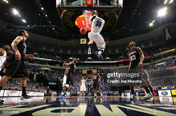 Stephens of the Memphis Tigers dunks the ball against the Harvard Crimson on January 19, 2013 at FedExForum in Memphis, Tennessee.