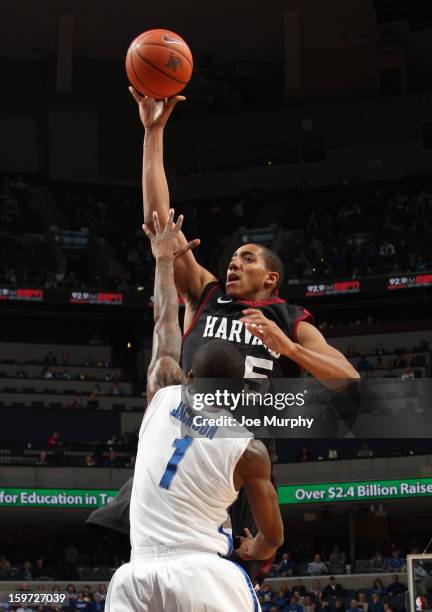 Kenyatta Smith of the Harvard Crimson shoots over Joe Jackson of the Memphis Tigers on January 19, 2013 at FedExForum in Memphis, Tennessee.