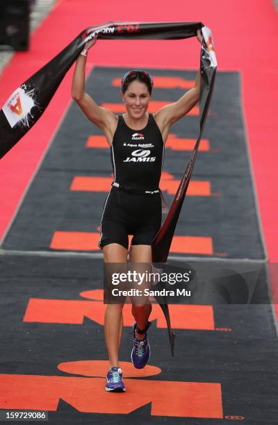 Annabel Luxford of Australia celebrates winning during the Ironman 70.3 Auckland triathlon on January 20, 2013 in Auckland, New Zealand.