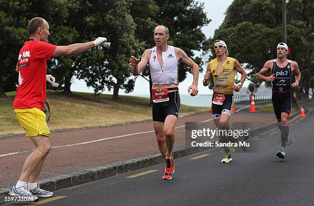 Bevan Docherty of New Zealand, Clark Ellice of New Zealand and Christian Kemp of Australia in action on the run leg during the Ironman 70.3 Auckland...