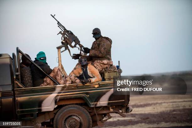 Convoy of Malian soldiers are pictured on their way for Mopti, on January 19, 2013 in Kongena. West African leaders Saturday sought urgent financial...