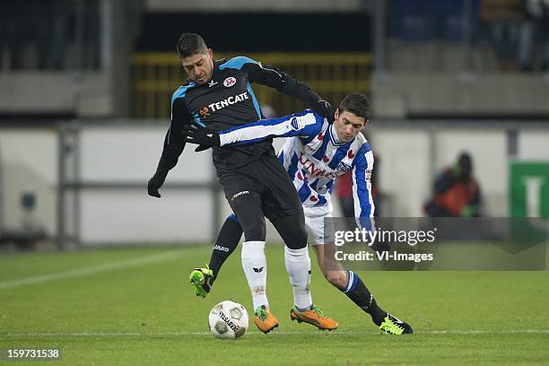 Everton Ramos da Silva of Heracles Almelo, Christian Kum of sc Heerenveen during the Dutch Eredivise match between SC Heerenveen and Heracles Almelo...