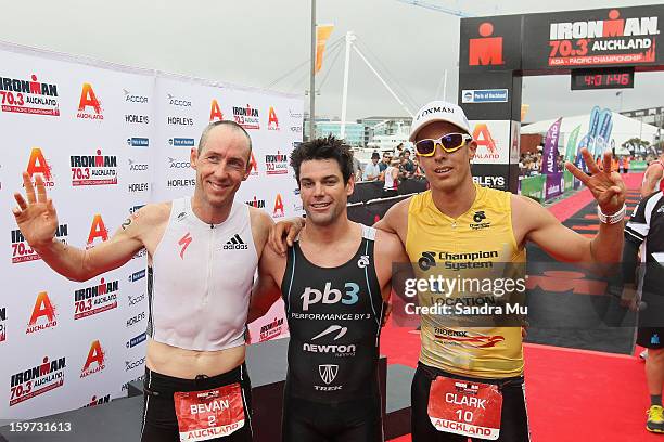 Bevan Docherty of New Zealand , Christian Kemp of Australia and Clark Ellice of New Zealand pose after placing at the Ironman 70.3 Auckland triathlon...