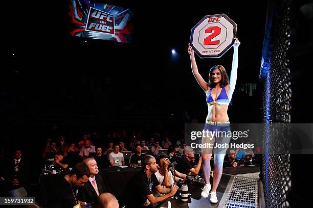 Octagon Girl Aline Caroline Franzoi introduces a round during the UFC on FX event on January 19, 2013 at Ibirapuera Gymnasium in Sao Paulo, Brazil.