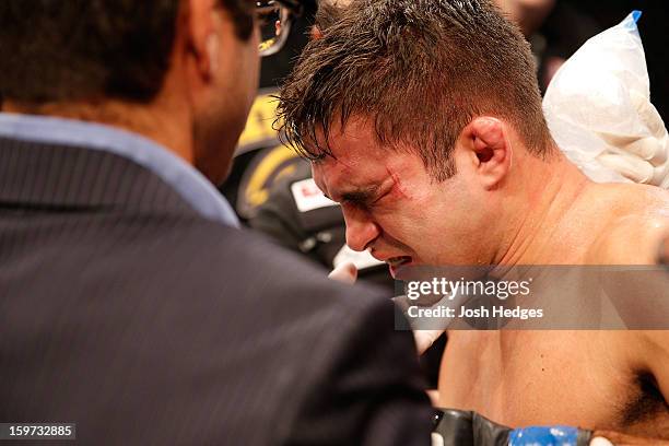 Pedro Nobre is treated by doctors after an illegal strike from Yuri Alcantara in their bantamweight fight at the UFC on FX event on January 19, 2013...