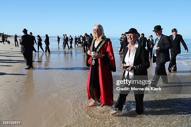 Participants leave the water after taking part in an art installation created by surrealist artist Andrew Baines on January 20, 2013 in Adelaide,...