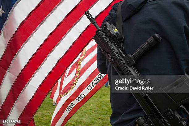 Demonstrator exercises his right to openly carry a rifle during a pro-gun rally on January 19, 2013 in Olympia, Washington. The Guns Across America...