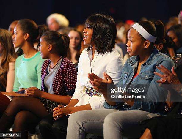 First lady Michelle Obama and her children attend the children's concert at the Washington Convention Center to celebrate military families on...