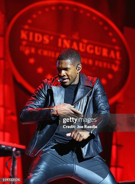 The musician Usher sings during the children's concert at the Washington Convention Center to celebrate military families on January 19, 2013 in...