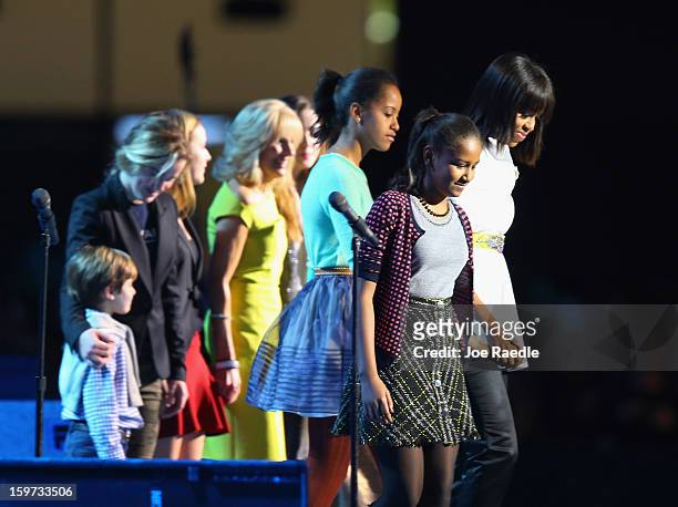 The First Lady Michelle Obama and her children along with Jill Biden and her family arrive for the children's concert at the Washington Convention...