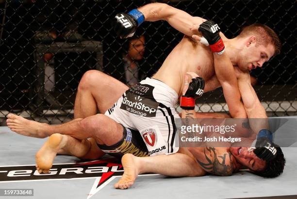 Nik Lentz punches Diego Nunes in their featherweight fight at the UFC on FX event on January 19, 2013 at Ibirapuera Gymnasium in Sao Paulo, Brazil.