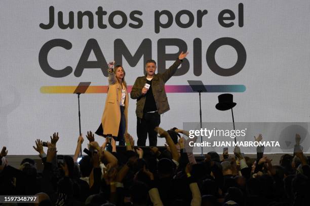Chief of Government of the City of Buenos Aires pre-candidate Jorge Macri celebrates with his partner Maria Belen Ludueña after defeating...