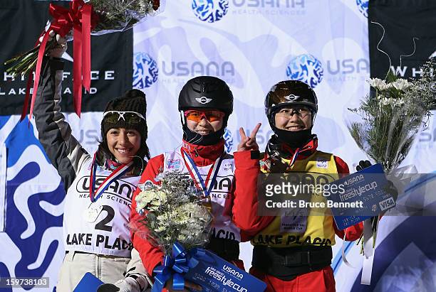 Lydia Lassila of Australia , Yu Tang of China and Mengtao Xu of China (second place take the podium after the USANA Freestyle World Cup aerial...