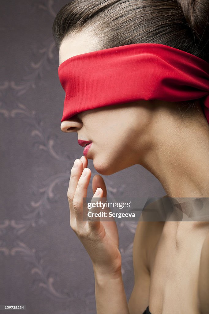 Young woman blindfold