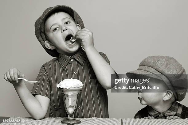 brothers with a sundae - ice cream sundae stockfoto's en -beelden