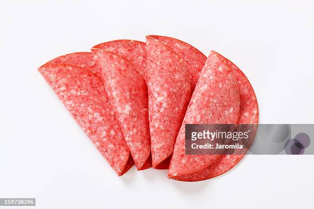 slices of a salami - salami stock pictures, royalty-free photos & images